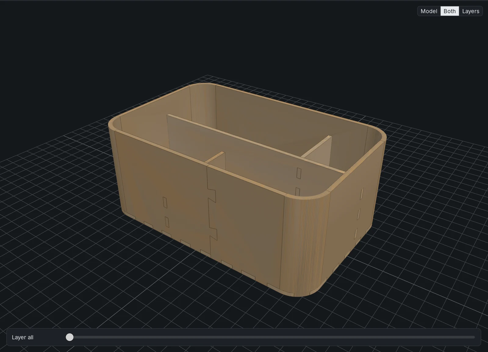 A desk organizer with rounded corners built from five plywood panels with finger joints
